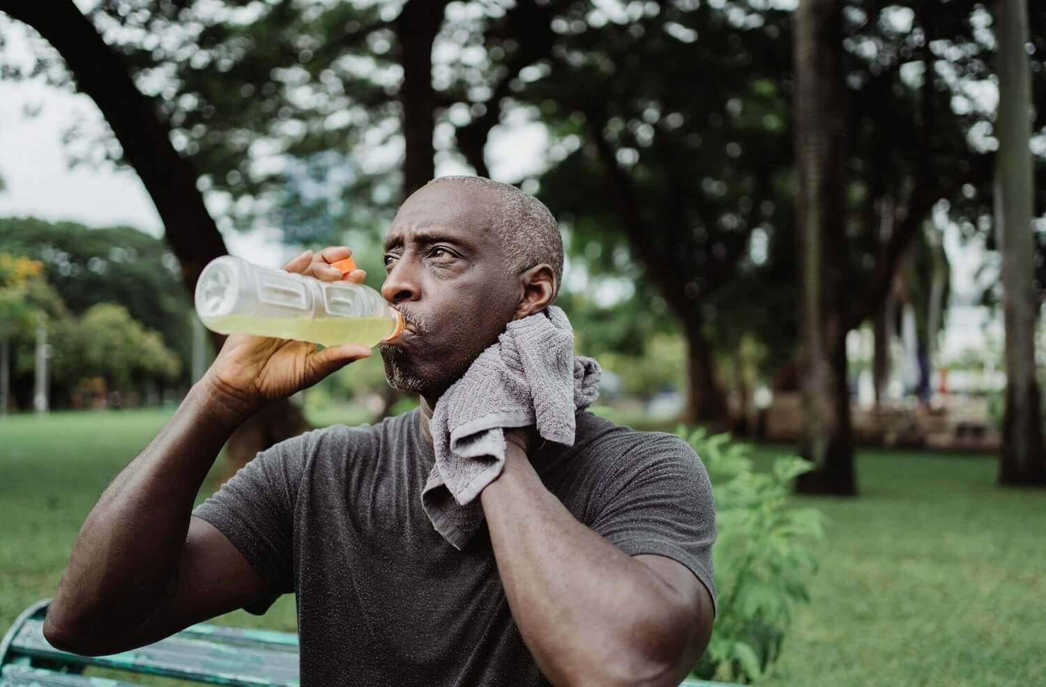 man-drinking-electrolyte-drink